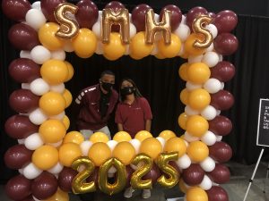 Two students framed in balloon frame