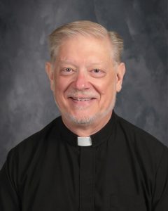 Headshot of Father Rick